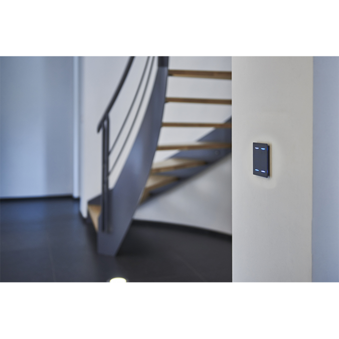 bouton design DPBR02 noir sur un mur