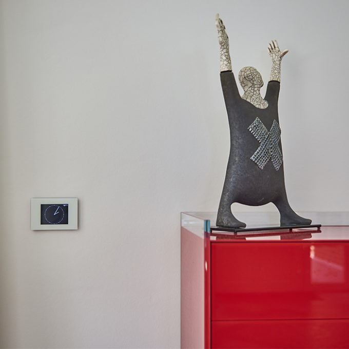 touch screen DPBRLCD in a designer interior with a statuette