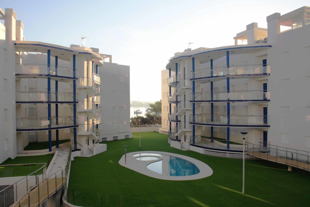 apartment buildings with central swimming pool